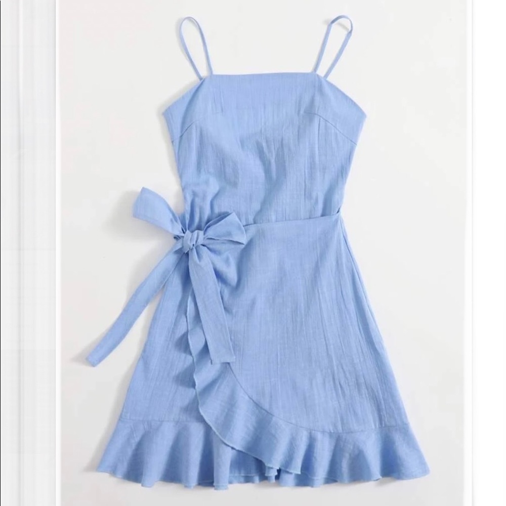 Never worn - light blue ruffle hem mini dress